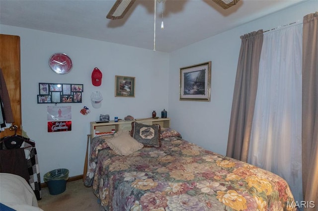 bedroom with carpet flooring and a ceiling fan