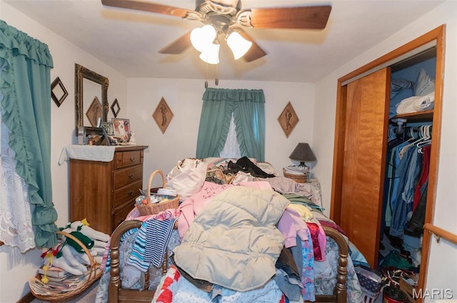 bedroom featuring a closet and ceiling fan