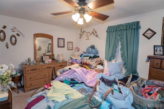 bedroom with carpet flooring and a ceiling fan