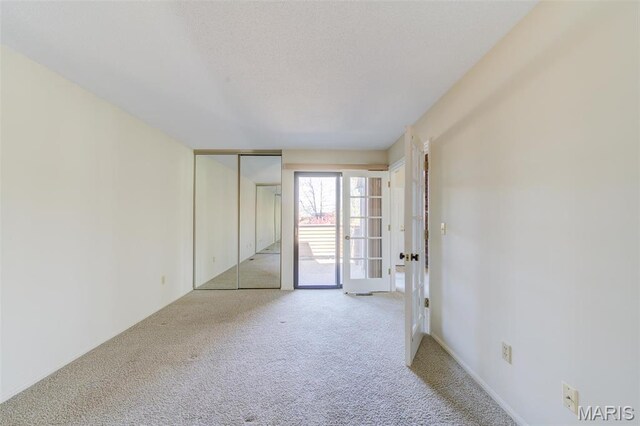 228 Hemingway Ln Unit F, Weldon Spring, MO 63304 - spare room featuring carpet flooring