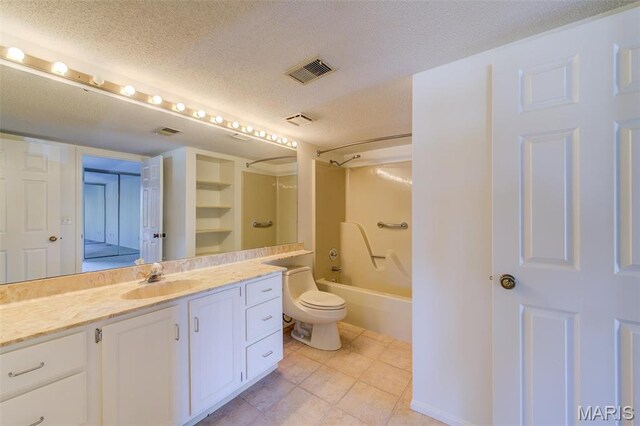 228 Hemingway Ln Unit F, Weldon Spring, MO 63304 - full bathroom with vanity, toilet, tub / shower combination, a textured ceiling, and tile patterned floors
