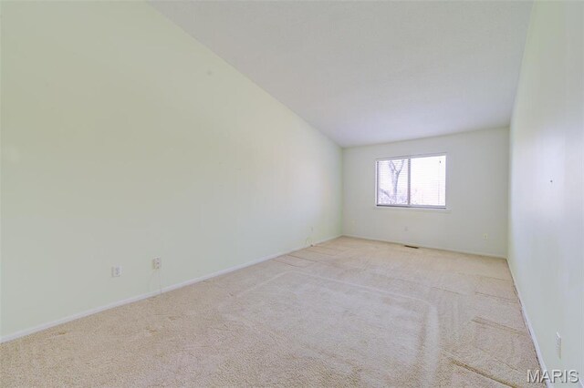 228 Hemingway Ln Unit F, Weldon Spring, MO 63304 - empty room featuring light colored carpet and baseboards