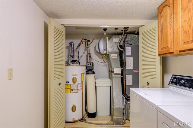 228 Hemingway Ln Unit F, Weldon Spring, MO 63304 - washroom with water heater, washer and dryer, and cabinet space