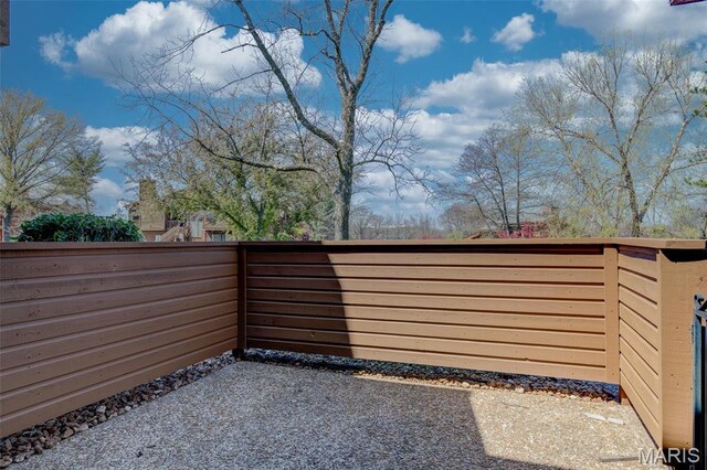 228 Hemingway Ln Unit F, Weldon Spring, MO 63304 - view of patio / terrace with fence