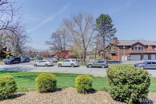 228 Hemingway Ln Unit F, Weldon Spring, MO 63304 - view of grassy yard