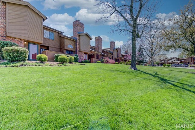 228 Hemingway Ln Unit F, Weldon Spring, MO 63304 - view of green lawn
