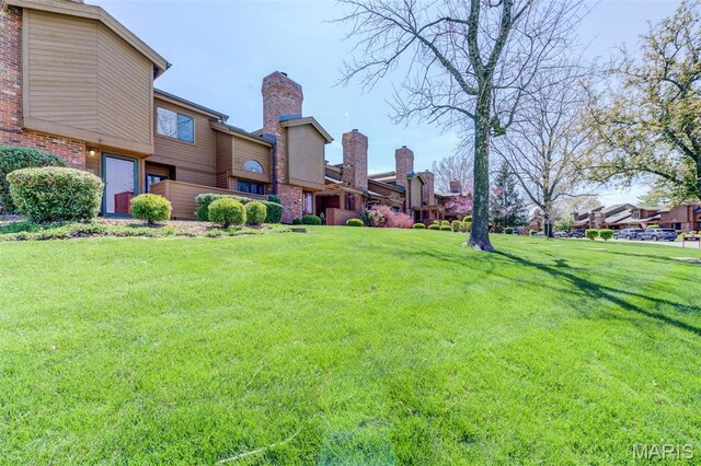 228 Hemingway Ln Unit F, Weldon Spring, MO 63304 - view of grassy yard