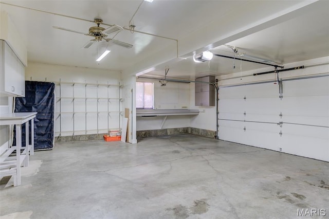 228 Hemingway Ln Unit F, Weldon Spring, MO 63304 - garage featuring a garage door opener and a ceiling fan