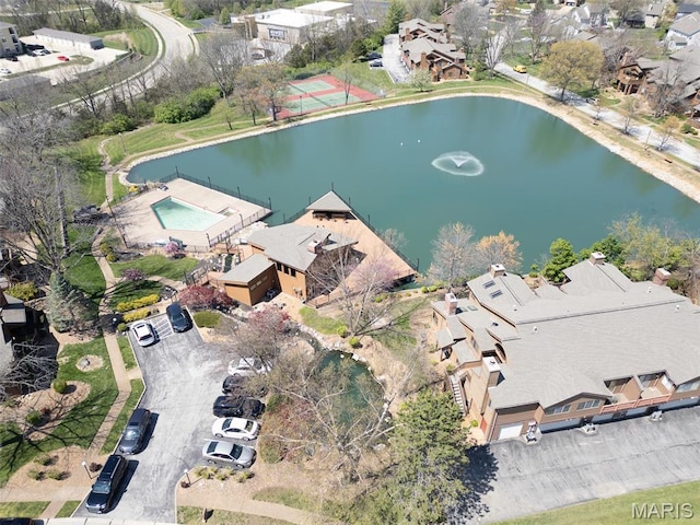 228 Hemingway Ln Unit F, Weldon Spring, MO 63304 - aerial view of property and surrounding area with a large body of water and nearby suburban area
