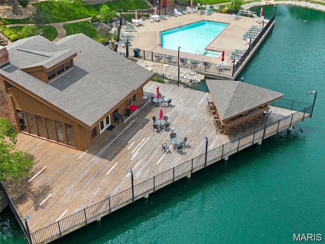 228 Hemingway Ln Unit F, Weldon Spring, MO 63304 - view from above of property with a pool area and a nearby body of water