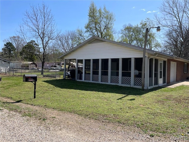 49 S St St, Piedmont, MO 63957 - rear view of house with a sunroom and brick siding