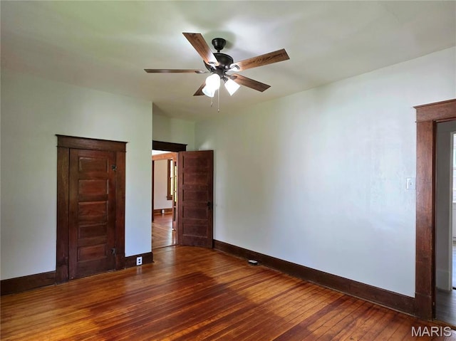 913 Maupin Ave, New Haven, MO 63068 - spare room with baseboards, wood-type flooring, and a ceiling fan