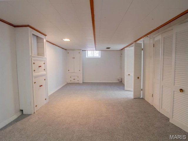 basement with light colored carpet