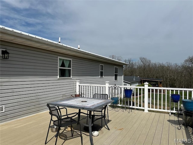 404 Crystal Ln, Rosebud, MO 63091 - wooden terrace with outdoor dining area