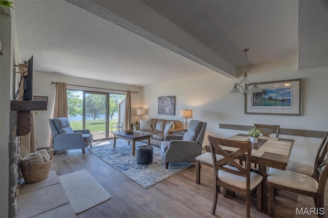 31 N Lionshead Dr, Innsbrook, MO 63390 - living room with a textured ceiling and wood finished floors
