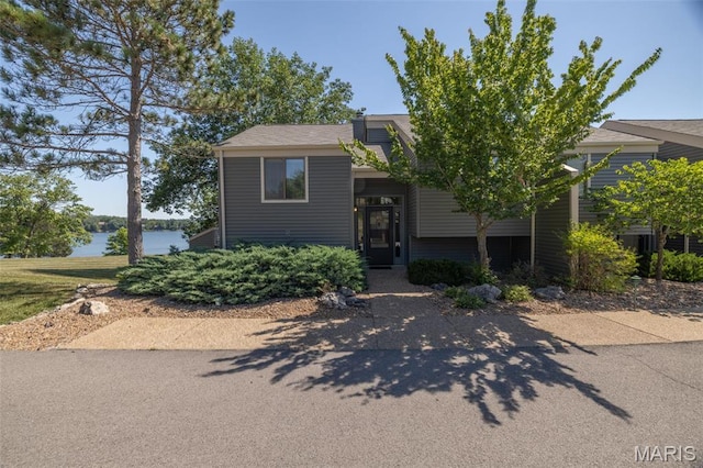 31 N Lionshead Dr, Innsbrook, MO 63390 - view of front of home with a water view and central AC unit