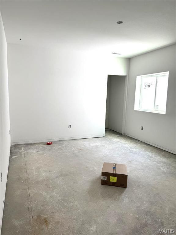 empty room featuring concrete floors