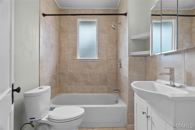 2326 Patton Ave, Saint Louis, MO 63144 - bathroom with  shower combination, toilet, vanity, and tile walls