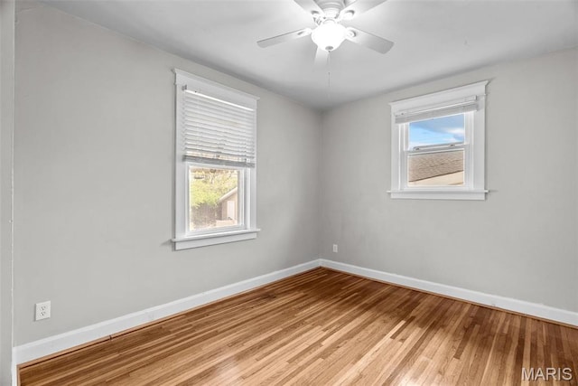 2326 Patton Ave, Saint Louis, MO 63144 - empty room featuring baseboards, wood finished floors, and a ceiling fan