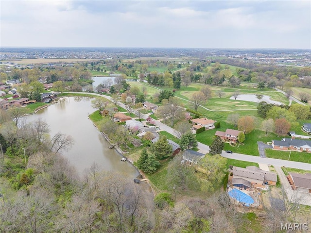 aerial overview of property's location featuring a nearby body of water and nearby suburban area