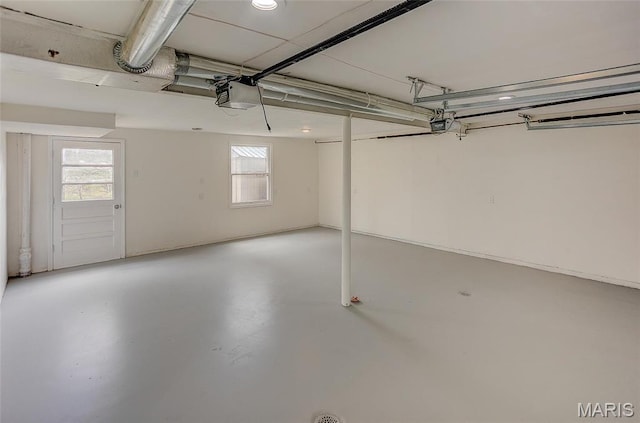 garage featuring a garage door opener