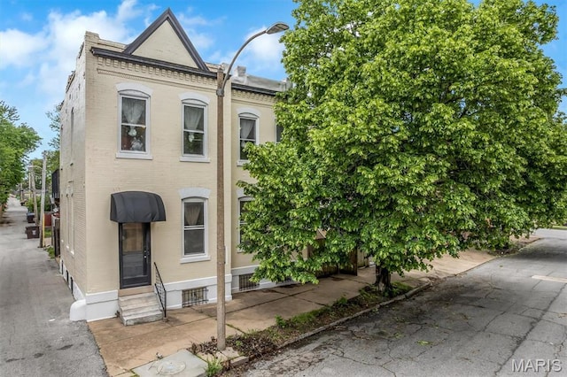 2811 Pennsylvania Ave, Saint Louis, MO 63118 - view of property featuring entry steps and brick siding