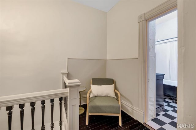 2811 Pennsylvania Ave, Saint Louis, MO 63118 - sitting room featuring tile patterned floors, an upstairs landing, and baseboards