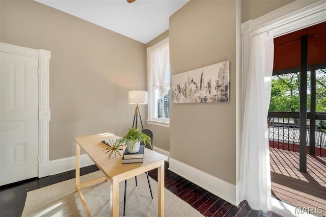 2811 Pennsylvania Ave, Saint Louis, MO 63118 - office area with baseboards, healthy amount of natural light, dark wood-type flooring, and vaulted ceiling