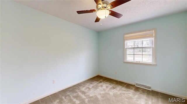 1402 Liberty Dr, Rolla, MO 65401 - carpeted empty room with baseboards and ceiling fan