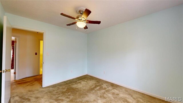 1402 Liberty Dr, Rolla, MO 65401 - carpeted empty room featuring a ceiling fan and baseboards