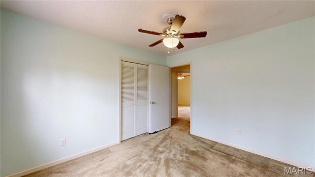 1402 Liberty Dr, Rolla, MO 65401 - unfurnished bedroom featuring a closet, baseboards, and carpet flooring