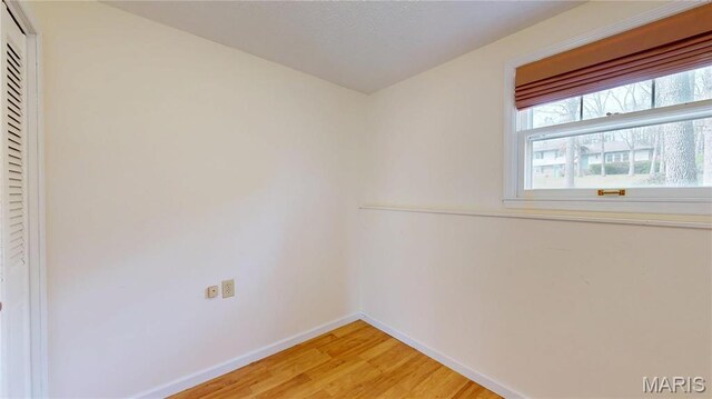 1402 Liberty Dr, Rolla, MO 65401 - spare room featuring light wood finished floors and baseboards