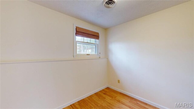 1402 Liberty Dr, Rolla, MO 65401 - spare room with light wood-style flooring and baseboards