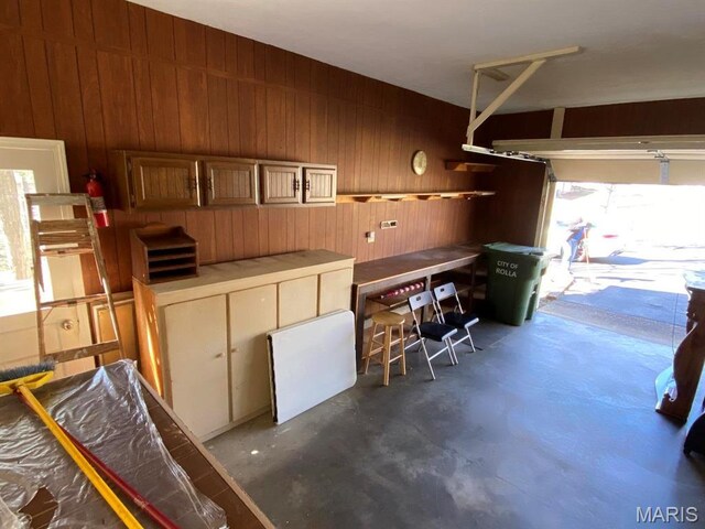 1402 Liberty Dr, Rolla, MO 65401 - garage featuring wooden walls