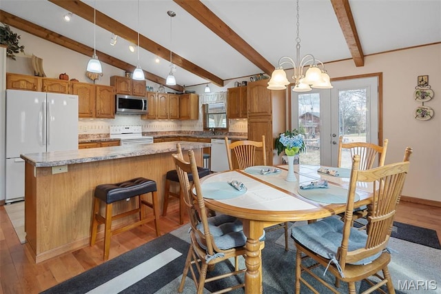 dining space with light wood-type flooring, a chandelier, french doors, baseboards, and recessed lighting