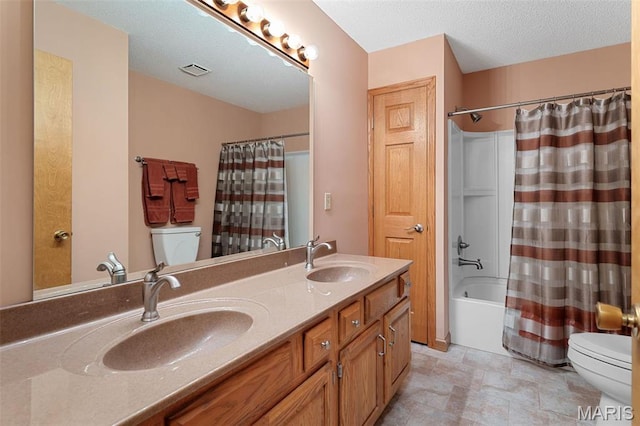 full bath featuring toilet, shower / tub combo with curtain, and double vanity