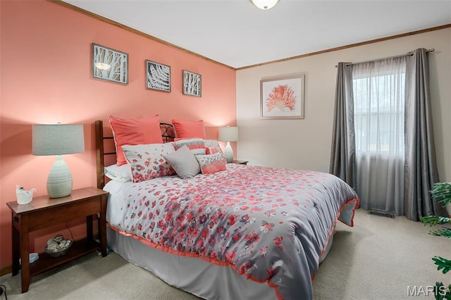 carpeted bedroom featuring ornamental molding