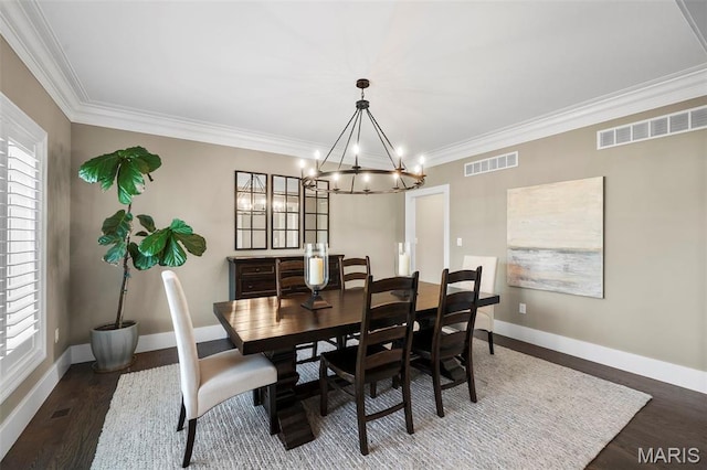 13750 Stonemont Ct, Town And Country, MO 63131 - dining room with wood finished floors, baseboards, a chandelier, crown molding, and plenty of natural light