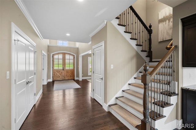13750 Stonemont Ct, Town And Country, MO 63131 - foyer entrance featuring ornamental molding, dark wood-type flooring, stairs, recessed lighting, and baseboards