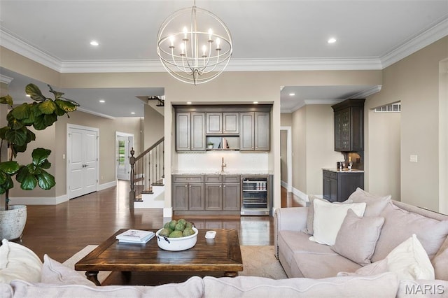 13750 Stonemont Ct, Town And Country, MO 63131 - living room featuring wine cooler, wood finished floors, stairs, crown molding, and baseboards