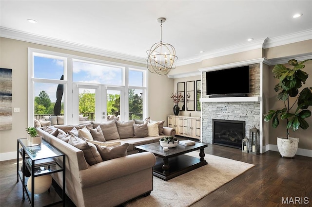 13750 Stonemont Ct, Town And Country, MO 63131 - living room featuring ornamental molding, a chandelier, a fireplace, baseboards, and dark wood-style flooring