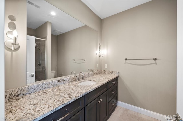 13750 Stonemont Ct, Town And Country, MO 63131 - full bathroom with vanity, a stall shower, toilet, baseboards, and marble look tiles