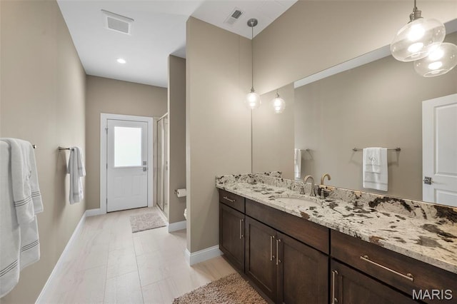 13750 Stonemont Ct, Town And Country, MO 63131 - full bathroom featuring vanity, a stall shower, baseboards, and toilet