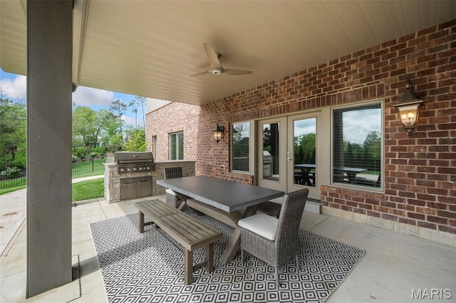 13750 Stonemont Ct, Town And Country, MO 63131 - view of patio with area for grilling, a ceiling fan, and outdoor dining space