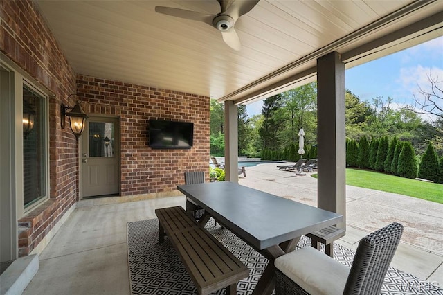 13750 Stonemont Ct, Town And Country, MO 63131 - view of patio / terrace featuring a ceiling fan, outdoor dining space, and an outdoor pool
