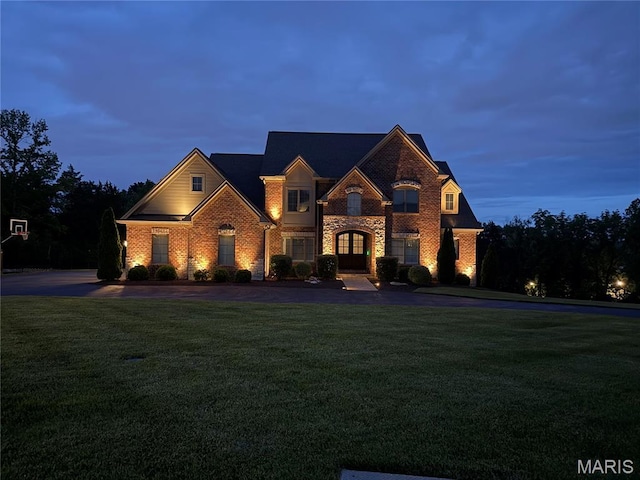 13750 Stonemont Ct, Town And Country, MO 63131 - view of front of home featuring a front lawn and brick siding