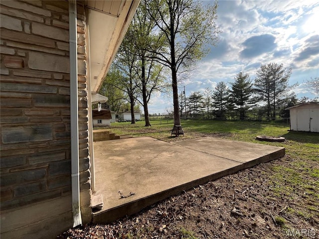 503 N Louise Ave, St James, MO 65559 - view of patio / terrace with a storage shed and an outbuilding