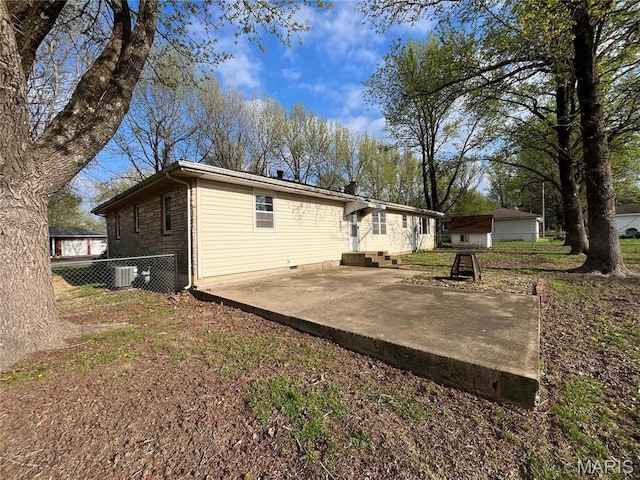 503 N Louise Ave, St James, MO 65559 - rear view of property featuring a patio area and fence