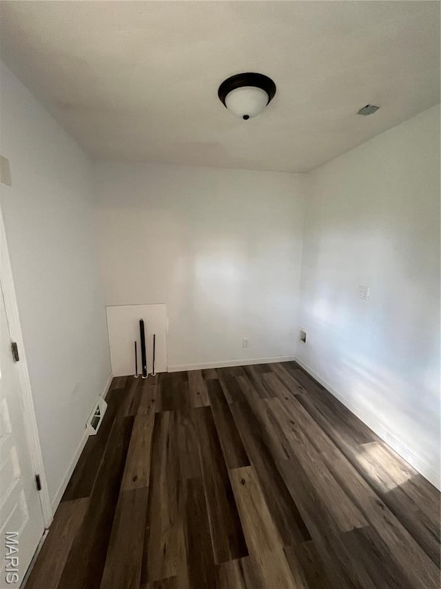 503 N Louise Ave, St James, MO 65559 - washroom with dark wood-type flooring and baseboards