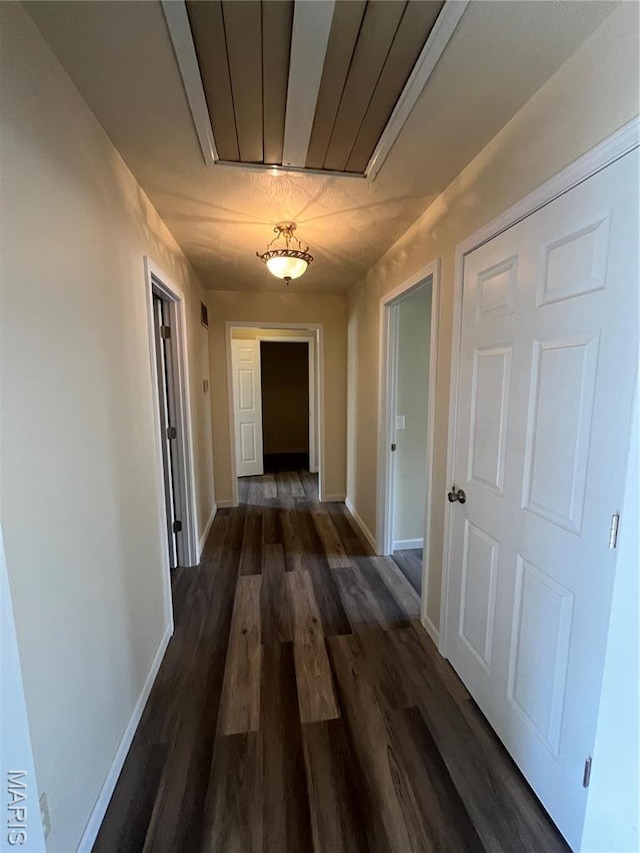 503 N Louise Ave, St James, MO 65559 - hallway with attic access, dark wood-style flooring, and baseboards